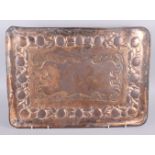 A Newlyn copper tray with embossed decoration, 23" wide