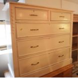 A pine white painted chest of two short and three long graduated drawers, on block base, 39" wide