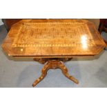 A 19th century Italian walnut octagonal parquetry top low occasional table, on turned column and