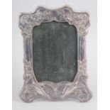 A silver Art Nouveau style picture frame, 8" high