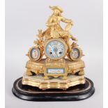 A late 19th century French gilt mantel clock with Van Dyck figure surmount and Sevres porcelain