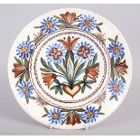 A Thun type wall plate with floral decoration, 9 3/4" dia