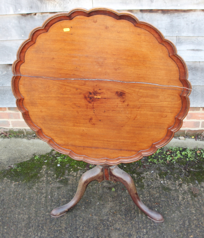 A 19th century mahogany piecrust tilt top occasional table, on baluster turned column and tripod - Image 4 of 5