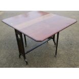 An Edwardian walnut Sutherland tea table, on splay supports, 42" long x 36" wide x 28 1/2" high when
