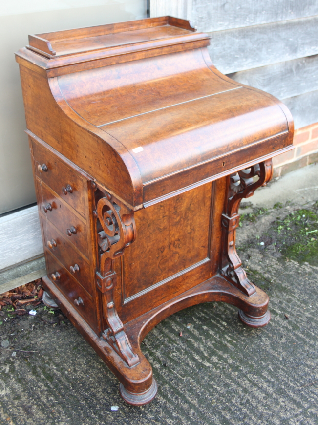 A Victorian burr walnut Davenport desk with rising stationery compartment, pull out adjustable