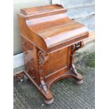 A Victorian burr walnut Davenport desk with rising stationery compartment, pull out adjustable
