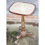 A 19th century giltwood, rosewood and brass inlaid occasional table with gros point needlework top,