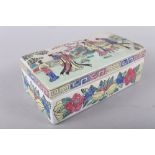 A Chinese porcelain figure decorated trinket box and cover, 7 1/2" wide