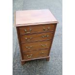 A mahogany chest of one drop front drawer and three long graduated drawers, on block base, 32"