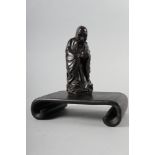 A Chinese bronzed and filled figure of Laotzu, 4 3/4" high, and a hardwood scroll vase stand, 6"