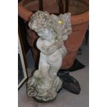 A cast stone figure of putto with a leaf, 28" high