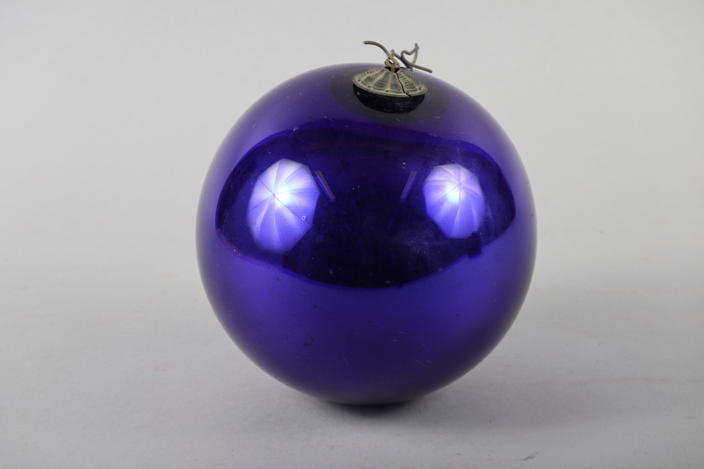 A late 19th century blue glass witch ball, 6 1/2" dia