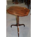 A Georgian provincial mahogany octagonal top occasional table, on turned column and tripod splay