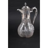 A late 19th century cut glass and silver mounted claret jug, mark for William Comyns