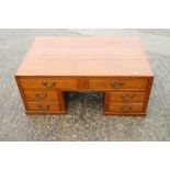 A Korean hardwood low table, fitted five drawers, on block base, 33 1/4" wide x 21" deep x 13 3/4"