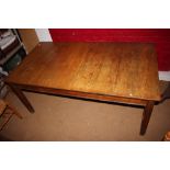 A waxed pine kitchen table, on square taper supports, 71" long x 38" wide x 30" high