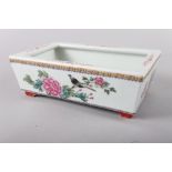 A Chinese porcelain famille rose decorated rectangular planter, 9 1/2" wide