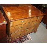 An 18th century walnut and banded chest of two short and two long drawers with brass handles and