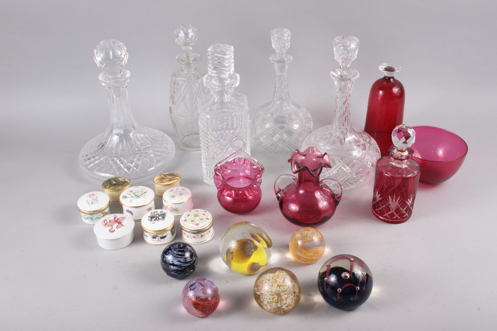 A Caithness "Moon Crystal" paperweight, five other paperweights, five decanters, cranberry glassware