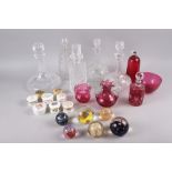 A Caithness "Moon Crystal" paperweight, five other paperweights, five decanters, cranberry glassware