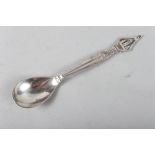 A Georg Jensen silver commemorative spoon with architectural finial, 1oz troy approx