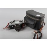 A Leicaflex SL Leitz Wetzlar camera, Serial Number 1295519 and Summircron R 1:2/50 lens, in