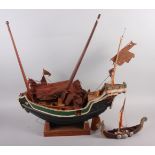 A Chinese painted hardwood and bamboo model of a junk, 23" long (in need of restoration) and a