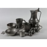 A 19th century pewter tappit hen, 10 1/2" high, a pewter pint measure, three small hand measures,