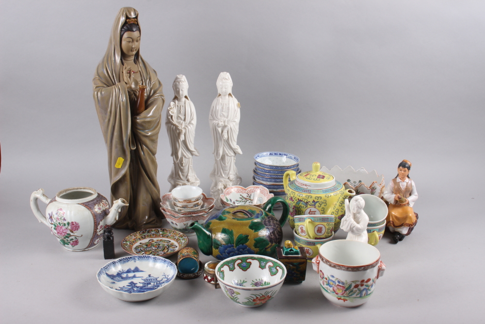 A Chinese yellow polychrome decorated teapot and four matching teacups, a planter with insect and