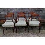 A set of six late 19th century carved bar back dining chairs with stuffed over seats upholstered