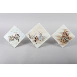 A set of three Japanese hand-painted porcelain tiles with samurai figure decoration, largest 6 3/