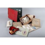 Five Wills albums of cigarette cards, a quantity of postcards, a cased pipe, in the form of a