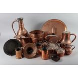A Middle Eastern hammered copper jug, two copper kettles, a Jersey jug, five other jugs and other