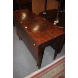 An early 20th century mahogany Sutherland dining table, 41" wide x 18" deep x 29" high (56" when