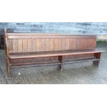 A late Victorian stained pine single-ended pew, 91" long