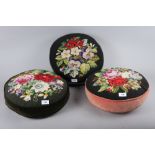 Three circular needlepoint cushions with floral designs, 15" dia