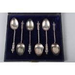 A set of six silver apostle coffee spoons, in fitted case, 1.6oz troy approx