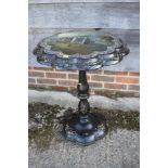 A Victorian black Japanned and mother-of-pearl inlaid shape tilt top occasional table with view of
