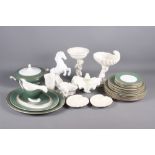 A green and gilt decorated part dinner service, two table centres and other decorative china