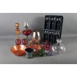 An iridescent glass vase, 3 3/4" high, a cranberry cut glass basket, a silvered glass vase, 8" high,