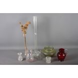 A Tiffany style iridescent green glass vase, 4 1/2" high, a cranberry jug, 6" high, a clear glass