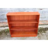 A Gordon Russell mahogany low open bookcase, fitted two adjustable shelves, on block base, 37" wide