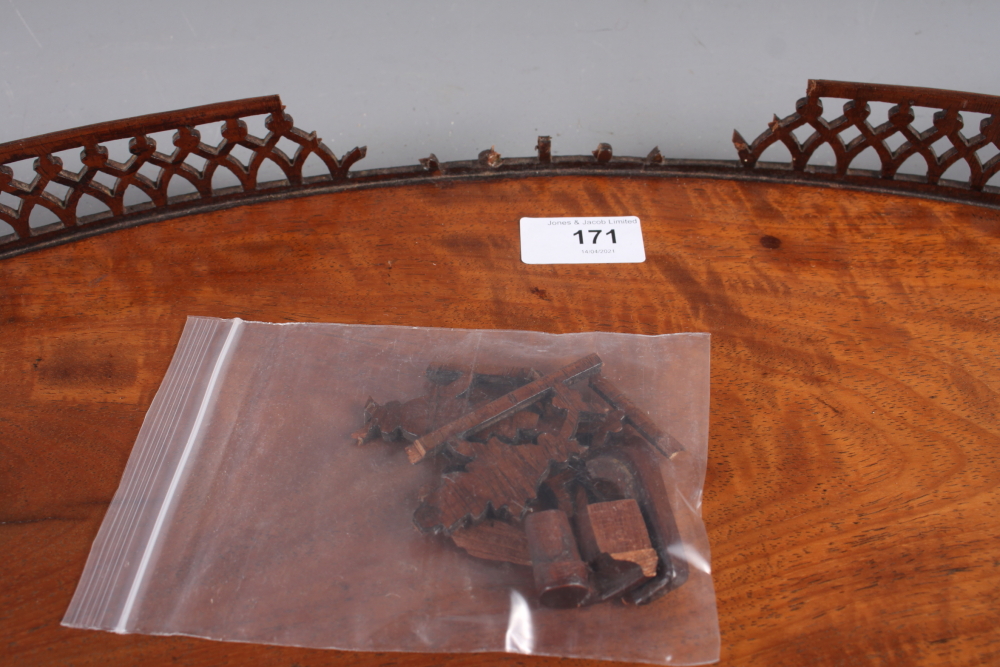 A late 19th century figured mahogany two-handled tray with pierced gallery, 29" wide (losses and - Image 4 of 4