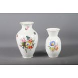 A Herend baluster vase with fruit and flower decoration on a canework ground, 9" high, and a Meissen