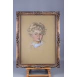 A pastel portrait of a child, monogrammed MC? 23" x 17", in gilt frame