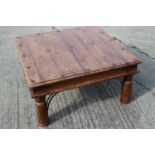 A sheesham square coffee table, on turned supports, 31 1/2" square