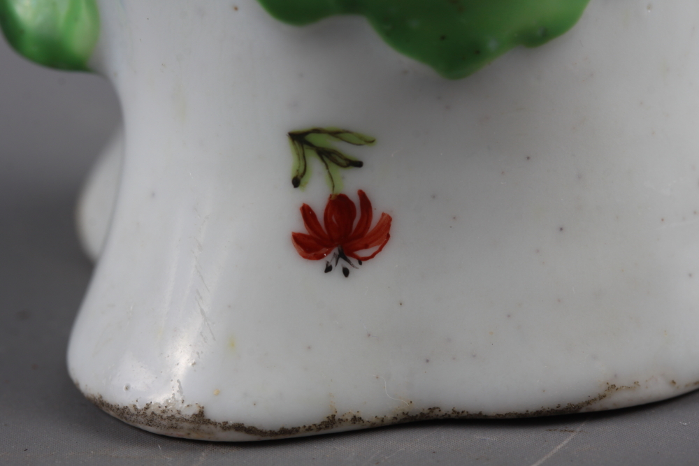 A Longton Hall cream jug with openwork twist handle and leaf relief decoration and enamel floral - Image 9 of 11