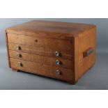A French oak canteen of cutlery with four drawers, 21" wide x 13" deep x 12" high (no contents)