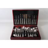 A Guy Degrenne canteen of stainless steel cutlery for six