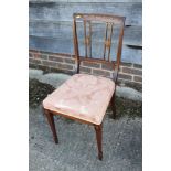 An Edwardian walnut and inlaid top rail bedroom chair